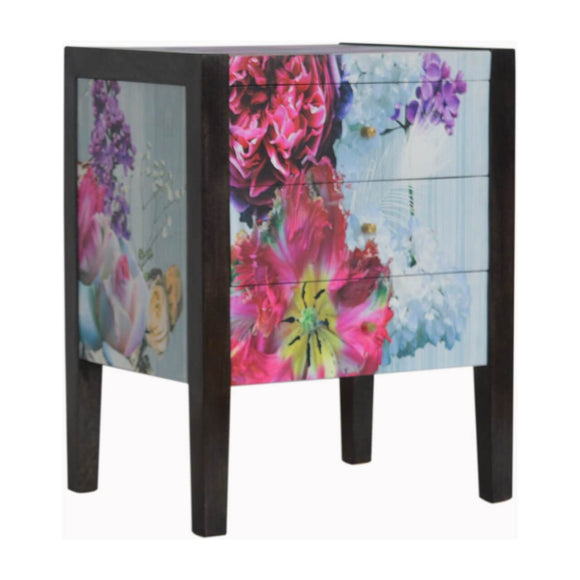 Petit meuble de rangement de forme rectangulaire imprimé tropical avec des lignes épurées coloris noir cendré en bois brut naturel.