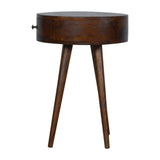 Table design scandinave ronde, parfaite pour compléter une table basse ronde et un meuble tv incurvé. 